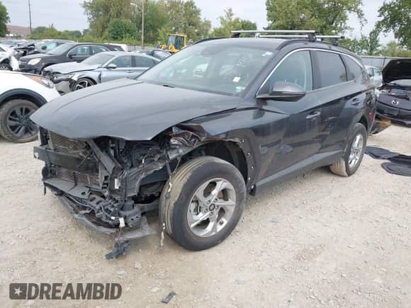 2022 Hyundai Tucson SEL z VIN 5NMJBCAEXNH088945, wystawiony jako IAAI lot #43153690 z przebiegiem 59 495 mil mil oraz . Historia ofert i sprzedaży dostępna na DreamBid. Obrazek 2.