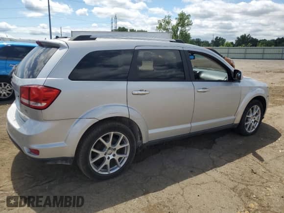 2013 Dodge Journey R/T z VIN 3C4PDDFG3DT606514, wystawiony jako Copart lot #65601315 z przebiegiem 129 236 mil mil oraz Czysty tytuł • Clean title. Historia ofert i sprzedaży dostępna na DreamBid. Obrazek 3.