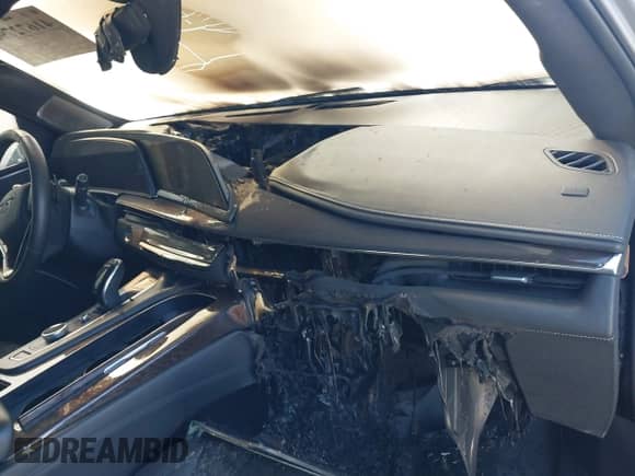 2023 Cadillac Escalade 4WD Sport Platinum with VIN 1GYS4GKL3PR220326, listed as a IAAI auction lot 41672790 with Not provided miles and . Bid and sale history available at DreamBid. Image 6.