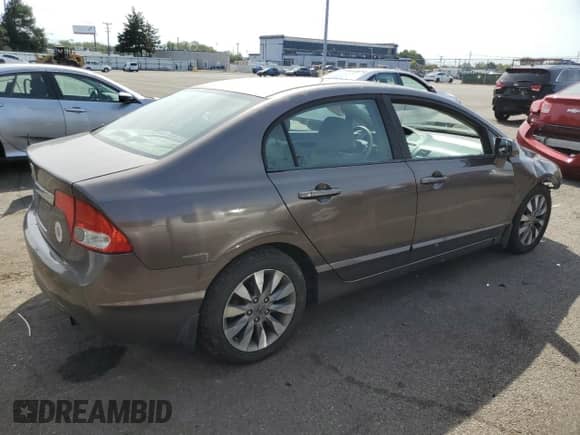 2010 Honda Civic with VIN 19FXA1F8XAE019092, listed as a Copart auction lot 71496354 with 185,077 mi miles and Salvage title. Bid and sale history available at DreamBid. Image 3.