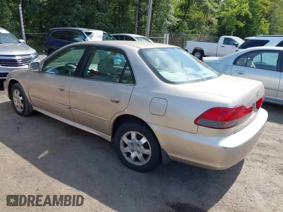2002 Honda Accord SE z VIN 1HGCG66882A157153, wystawiony jako IAAI lot #43104861 z przebiegiem 354 279 mil mil oraz . Historia ofert i sprzedaży dostępna na DreamBid. Obrazek 3.