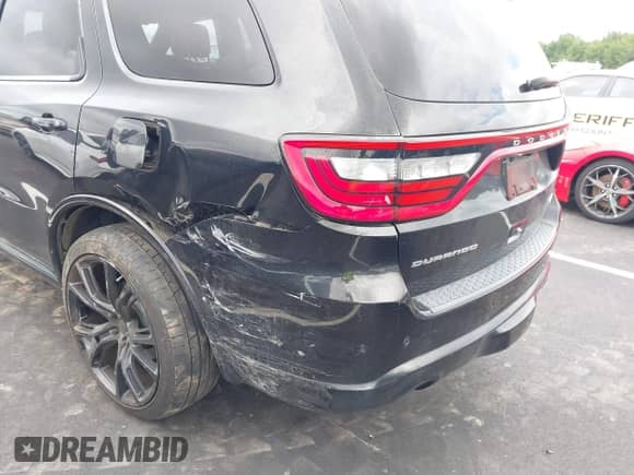 2014 Dodge Durango R/T with VIN 1C4SDHCT2EC313395, listed as a IAAI auction lot 42958438 with 113,110 mi miles and . Bid and sale history available at DreamBid. Image 6.
