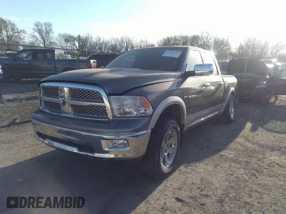 2011 Ram 1500 Big Horn with VIN 1D7RV1CT3BS710169, listed as a IAAI auction lot 41816546 with 141,551 mi miles and . Bid and sale history available at DreamBid. Image 2.