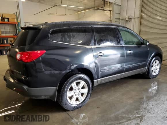 2012 Chevrolet Traverse 1LT с VIN 1GNKVGED7CJ423081, выставлен на аукционе Copart как лот 82308625 с пробегом 212 726 миль миль и Списание • Salvage title. История ставок и продаж доступна на DreamBid. Изображение 3.