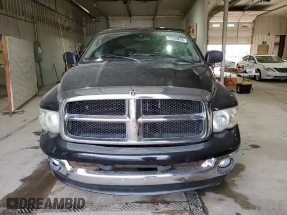 2004 Dodge 1500 ST with VIN 1D3HU18D24J205931, listed as a Copart auction lot 82559654 with 104,793 mi miles and Salvage title. Bid and sale history available at DreamBid. Image 5.