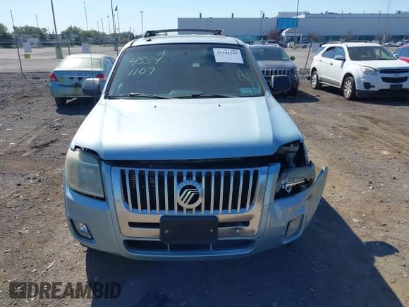 2008 Mercury Mariner with VIN 4M2CU91198KJ24730, listed as a IAAI auction lot 43341107 with 158,521 mi miles and . Bid and sale history available at DreamBid. Image 12.