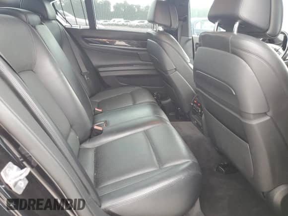 2014 BMW 7 Series 750i xDrive with VIN WBAYB6C53ED224559, listed as a Copart auction lot 58124485 with 114,753 mi miles and Salvage title. Bid and sale history available at DreamBid. Image 10.