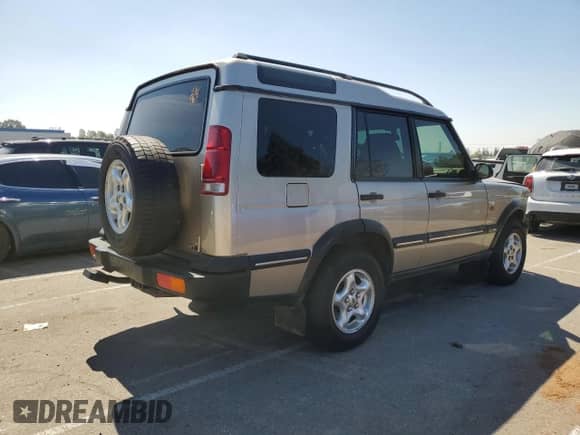 2000 Land Rover Discovery Cloth with VIN SALTY1549YA276568, listed as a Copart auction lot 66630435 with 134,486 mi miles and Salvage title. Bid and sale history available at DreamBid. Image 3.