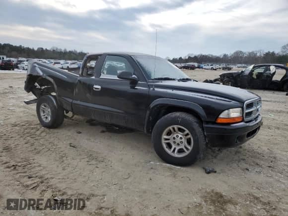 2002 Dodge Dakota с VIN 1B7GL12X52S669183, выставлен на аукционе Copart как лот 89385785 с пробегом 115 026 миль миль и Списание • Salvage title. История ставок и продаж доступна на DreamBid. Изображение 4.