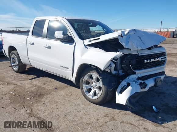 2022 Ram 1500 Big Horn z VIN 1C6RREBT7NN452563, wystawiony jako IAAI lot #41297916 z przebiegiem 27 231 mil mil oraz . Historia ofert i sprzedaży dostępna na DreamBid. Obrazek 1.