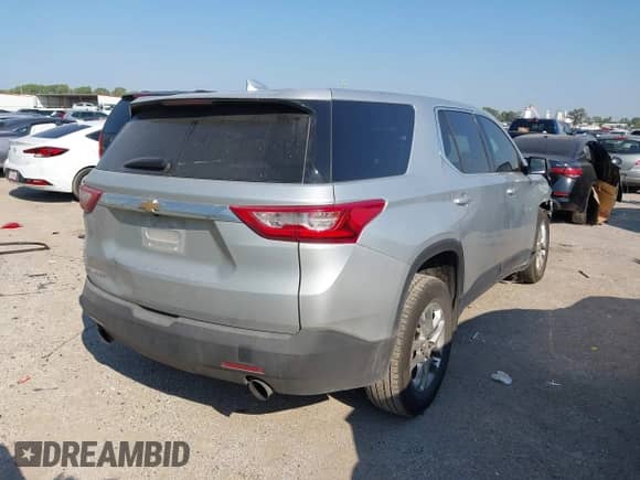 2021 Chevrolet Traverse LS with VIN 1GNERFKW2MJ128022, listed as a IAAI auction lot 43224649 with 145,685 mi miles and . Bid and sale history available at DreamBid. Image 4.
