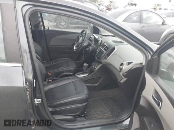 2013 Chevrolet Sonic LTZ with VIN 1G1JE6SH0D4175027, listed as a IAAI auction lot 42864537 with 100,900 mi miles and . Bid and sale history available at DreamBid. Image 5.