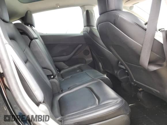 2022 Tesla Model Y Long Range with VIN 7SAYGAEE0NF340771, listed as a Copart auction lot 85189405 with 60,930 mi miles and Salvage title. Bid and sale history available at DreamBid. Image 11.