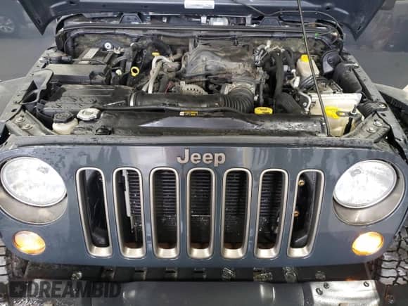 2018 Jeep Wrangler Sport with VIN 1C4AJWAG8JL892577, listed as a Copart auction lot 50135575 with 143,687 mi miles and Salvage title. Bid and sale history available at DreamBid. Image 12.