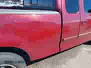 1999 Ford F-150 with VIN 1FTRX17W3XKB03527, listed as a IAAI auction lot 43450405 with 121,752 mi miles and . Bid and sale history available at DreamBid. Image 18.