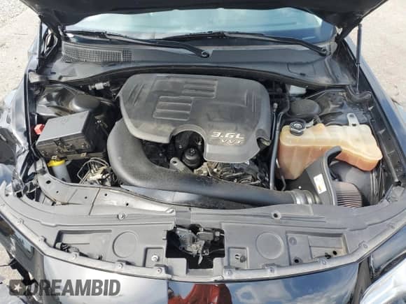 2017 Chrysler 300 Limited z VIN 2C3CCARG6HH610460, wystawiony jako Copart lot #65541315 z przebiegiem 103 305 mil mil oraz Szkoda całkowita • Salvage title. Historia ofert i sprzedaży dostępna na DreamBid. Obrazek 11.