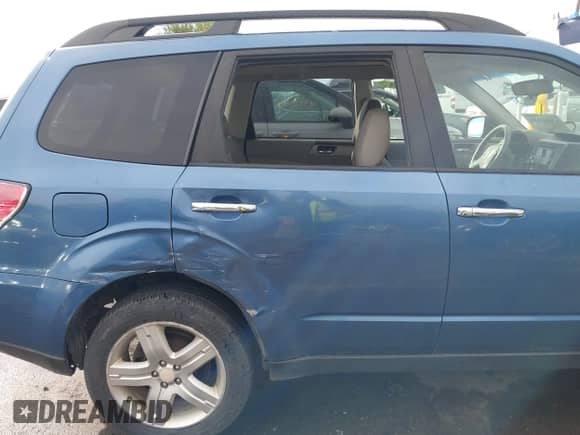 2009 Subaru Forester X Limited z VIN JF2SH64629H757159, wystawiony jako IAAI lot #43465486 z przebiegiem 177 257 mil mil oraz . Historia ofert i sprzedaży dostępna na DreamBid. Obrazek 6.