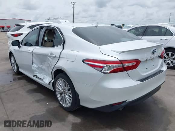 2020 Toyota Camry Hybrid XLE with VIN 4T1F31AK6LU540730, listed as a IAAI auction lot 42368941 with 91,035 mi miles and . Bid and sale history available at DreamBid. Image 3.