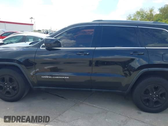 2014 Jeep Grand Cherokee Laredo with VIN 1C4RJEAG3EC157024, listed as a IAAI auction lot 43396333 with 268,228 mi miles and . Bid and sale history available at DreamBid. Image 14.