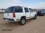 1995 Chevrolet Tahoe z VIN 1GNEK13K8SJ452589, wystawiony jako IAAI lot #41788147 z przebiegiem 291 313 mil mil oraz . Historia ofert i sprzedaży dostępna na DreamBid. Obrazek 4.