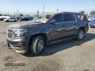 2017 Chevrolet Suburban LS with VIN 1GNSCGKC3HR399047, listed as a Copart auction lot 62225855 with 127,849 mi miles and Salvage title. Bid and sale history available at DreamBid. Image 1.