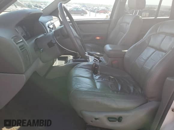 2002 Jeep Grand Cherokee Limited with VIN 1J4GX58N12C282300, listed as a Copart auction lot 74939754 with 166,018 mi miles and Salvage title. Bid and sale history available at DreamBid. Image 7.