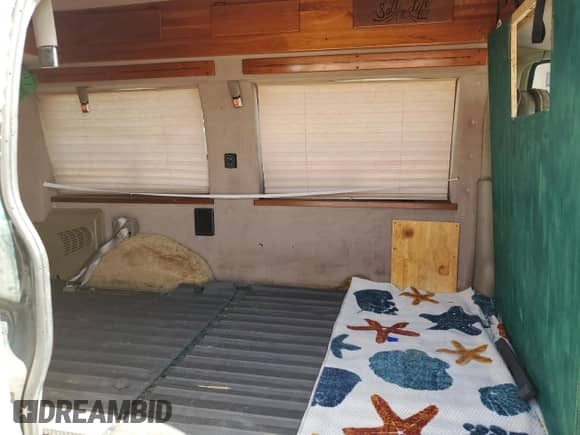 2002 Chevrolet Express с VIN 1GBFG15R221228585, выставлен на аукционе Copart как лот 63634835 с пробегом 197 718 миль миль и Списание • Salvage title. История ставок и продаж доступна на DreamBid. Изображение 11.