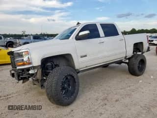 2017 Chevrolet Silverado 1500 LT с VIN 3GCPCREH7HG232224, выставлен на аукционе Copart как лот 84614215 с пробегом 104 344 миль миль и Списание • Salvage title. История ставок и продаж доступна на DreamBid. Изображение 1.
