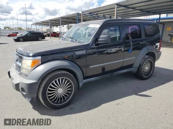 2008 Dodge Nitro SXT with VIN 1D8GT28K28W286791, listed as a Copart auction lot 80116585 with 179,252 mi miles and Salvage title. Bid and sale history available at DreamBid. Image 1.