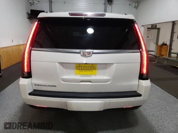 2015 Cadillac Escalade ESV Premium с VIN 1GYS4TKJ6FR615445, выставлен на аукционе Copart как лот 90133125 с пробегом 85 220 миль миль и Чистый • Clean title. История ставок и продаж доступна на DreamBid. Изображение 6.