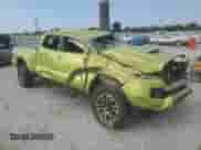 2023 Toyota Tacoma SR5 with VIN 3TYDZ5BN7PT020108, listed as a Copart auction lot 81069145 with 27,371 mi miles and Salvage title. Bid and sale history available at DreamBid. Image 4.