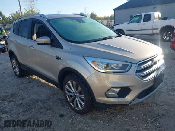 2017 Ford Escape Titanium with VIN 1FMCU0JD5HUC33262, listed as a IAAI auction lot 43427683 with 150,816 mi miles and . Bid and sale history available at DreamBid. Image 1.
