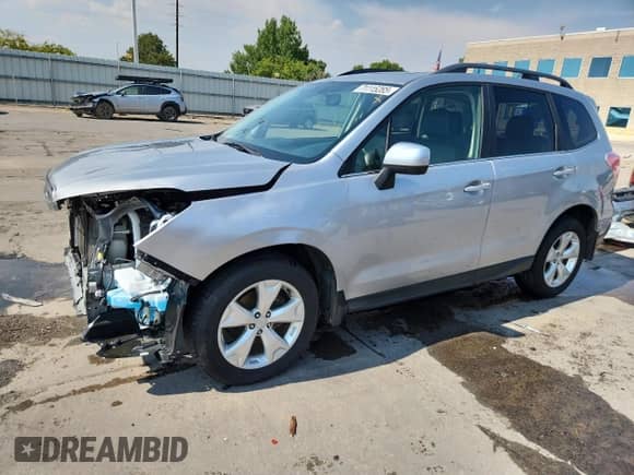 2014 Subaru Forester Limited z VIN JF2SJAHCXEH455054, wystawiony jako Copart lot #71115285 z przebiegiem 88 601 mil mil oraz Szkoda całkowita • Salvage title. Historia ofert i sprzedaży dostępna na DreamBid. Obrazek 1.