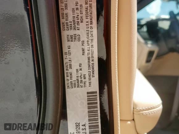 2023 Jeep Grand Cherokee Limited with VIN 1C4RJGBG2P8891282, listed as a Copart auction lot 66655465 with 35,774 mi miles and Salvage title. Bid and sale history available at DreamBid. Image 12.