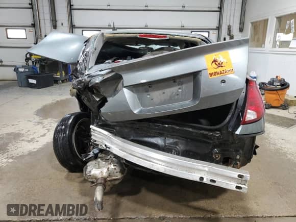 2006 Saturn ION z VIN 1G8AL55B56Z172221, wystawiony jako Copart lot #85042634 z przebiegiem Nie podano mil oraz Szkoda całkowita • Salvage title. Historia ofert i sprzedaży dostępna na DreamBid. Obrazek 6.