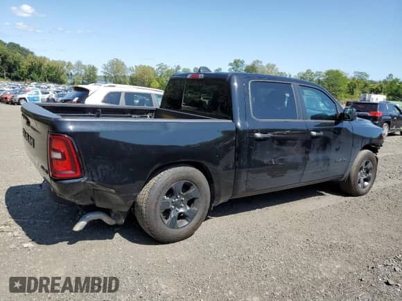 2025 Ram 1500 Tradesman with VIN 1C6RRFGG0SN554431, listed as a Copart auction lot 80143395 with 12,146 mi miles and Salvage title. Bid and sale history available at DreamBid. Image 3.