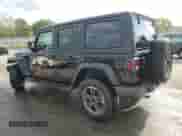 2023 Jeep Wrangler Sahara Altitude with VIN 1C4HJXEG1PW600466, listed as a Copart auction lot 80017505 with 21,912 mi miles and Salvage title. Bid and sale history available at DreamBid. Image 2.