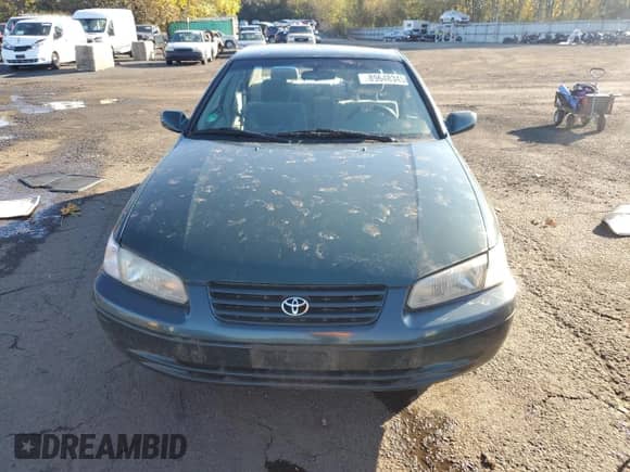 1999 Toyota Camry LE z VIN JT2BF28KXX0206776, wystawiony jako Copart lot #89648345 z przebiegiem 212 122 mil mil oraz Szkoda całkowita • Salvage title. Historia ofert i sprzedaży dostępna na DreamBid. Obrazek 5.