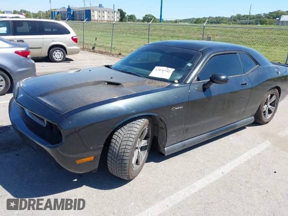 2009 Dodge Challenger R/T z VIN 2B3LJ54T09H558338, wystawiony jako IAAI lot #43076962 z przebiegiem 165 430 mil mil oraz . Historia ofert i sprzedaży dostępna na DreamBid. Obrazek 17.