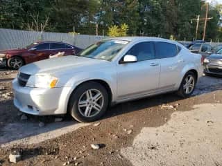 2010 Dodge Avenger Express z VIN 1B3CC1FB3AN229149, wystawiony jako Copart lot #85600055 z przebiegiem 161 467 mil mil oraz Szkoda całkowita • Salvage title. Historia ofert i sprzedaży dostępna na DreamBid. Obrazek 1.