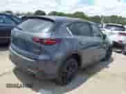 2023 Mazda CX-5 S Preferred z VIN JM3KFBCM2P0233638, wystawiony jako IAAI lot #42915682 z przebiegiem 62 982 mil mil oraz . Historia ofert i sprzedaży dostępna na DreamBid. Obrazek 4.