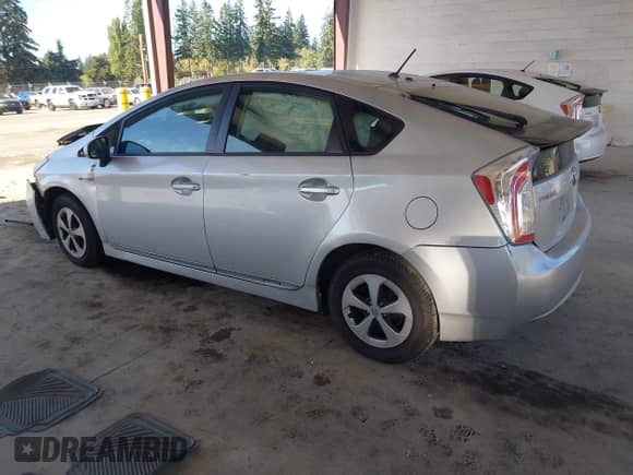 2013 Toyota Prius Three z VIN JTDKN3DU1D5671629, wystawiony jako IAAI lot #43402034 z przebiegiem 127 354 mil mil oraz . Historia ofert i sprzedaży dostępna na DreamBid. Obrazek 3.