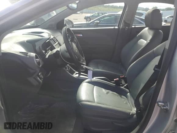 2015 Chevrolet Sonic LTZ with VIN 1G1JE5SB5F4130609, listed as a Copart auction lot 61953685 with 78,747 mi miles and Salvage title. Bid and sale history available at DreamBid. Image 7.