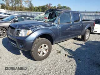 2013 Nissan Frontier SV with VIN 1N6AD0FV5DN743240, listed as a Copart auction lot 74468674 with 162,697 mi miles and Salvage title. Bid and sale history available at DreamBid. Image 1.