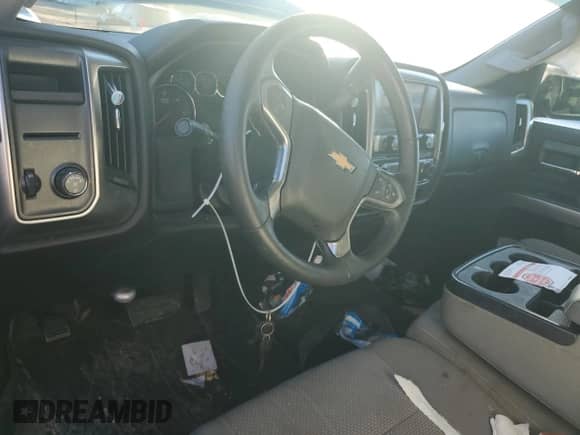 2017 Chevrolet Silverado 1500 LT with VIN 3GCPCREH1HG282357, listed as a Copart auction lot 83565994 with 175,108 mi miles and Salvage title. Bid and sale history available at DreamBid. Image 8.