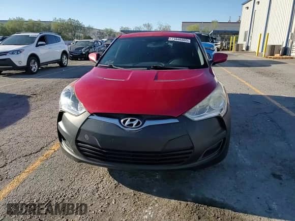 2013 Hyundai Veloster w/Black Int с VIN KMHTC6AD0DU166697, выставлен на аукционе Copart как лот 71646805 с пробегом 158 640 миль миль и Списание • Salvage title. История ставок и продаж доступна на DreamBid. Изображение 14.