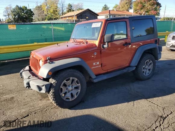 2009 Jeep Wrangler X with VIN 1J4FA24149L707842, listed as a Copart auction lot 85186375 with 142,001 mi miles and Clean title. Bid and sale history available at DreamBid. Image 1.