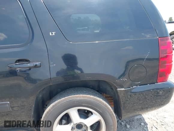2012 Chevrolet Tahoe LT with VIN 1GNSCBE01CR130929, listed as a IAAI auction lot 42342129 with 234,628 mi miles and . Bid and sale history available at DreamBid. Image 17.