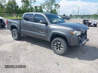 2017 Toyota Tacoma SR5 with VIN 5TFAZ5CN5HX049602, listed as a IAAI auction lot 43070186 with 119,102 mi miles and . Bid and sale history available at DreamBid. Image 1.