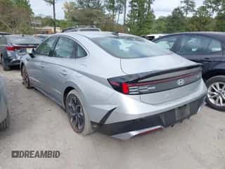 2025 Hyundai Sonata SEL with VIN KMHL64JA4SA485620, listed as a IAAI auction lot 43387929 with 14,958 mi miles and . Bid and sale history available at DreamBid. Image 3.